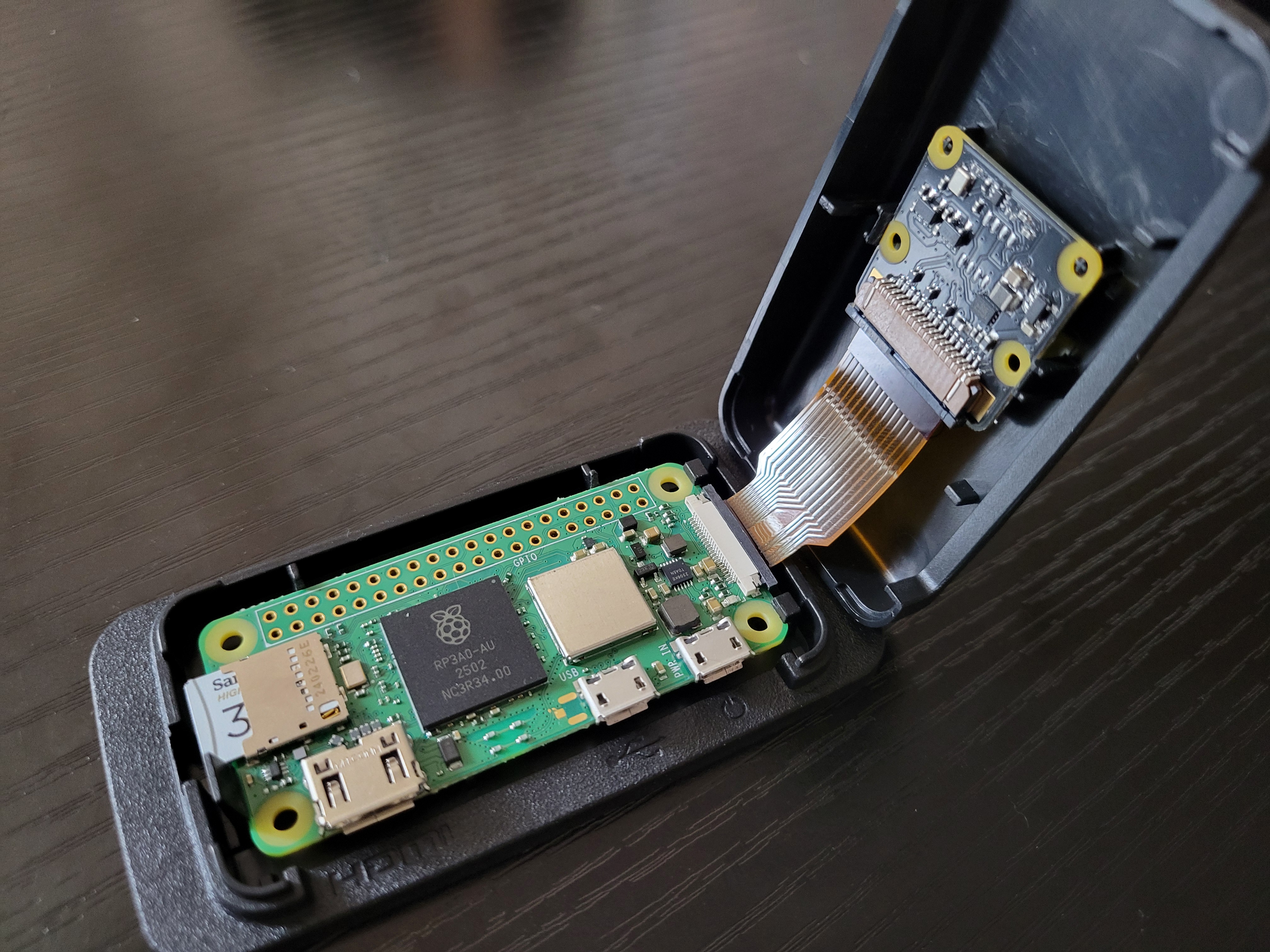 Pi Zero 2 W with camera module inside weatherproof enclosure